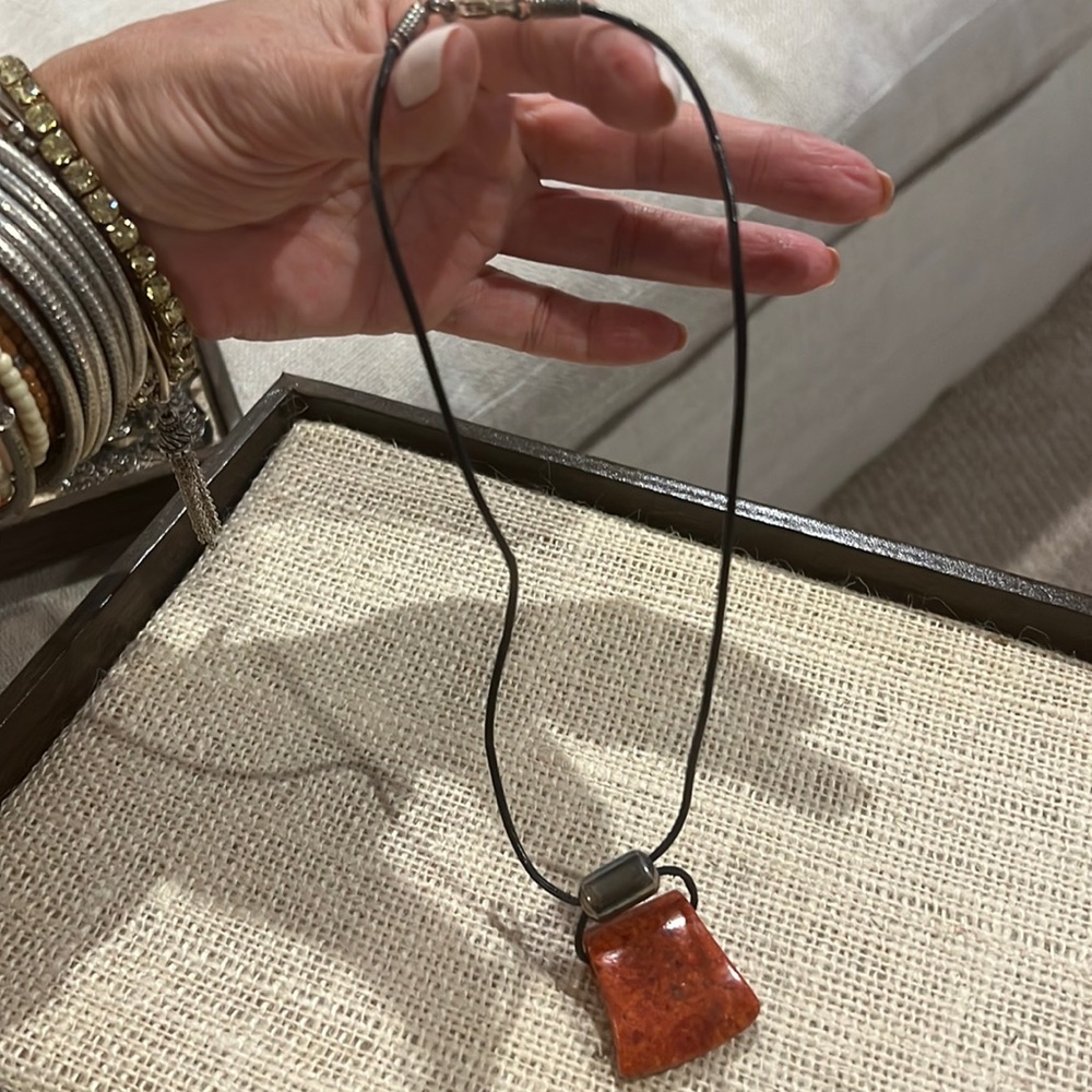 Reddish stone necklace on leather chain🌸